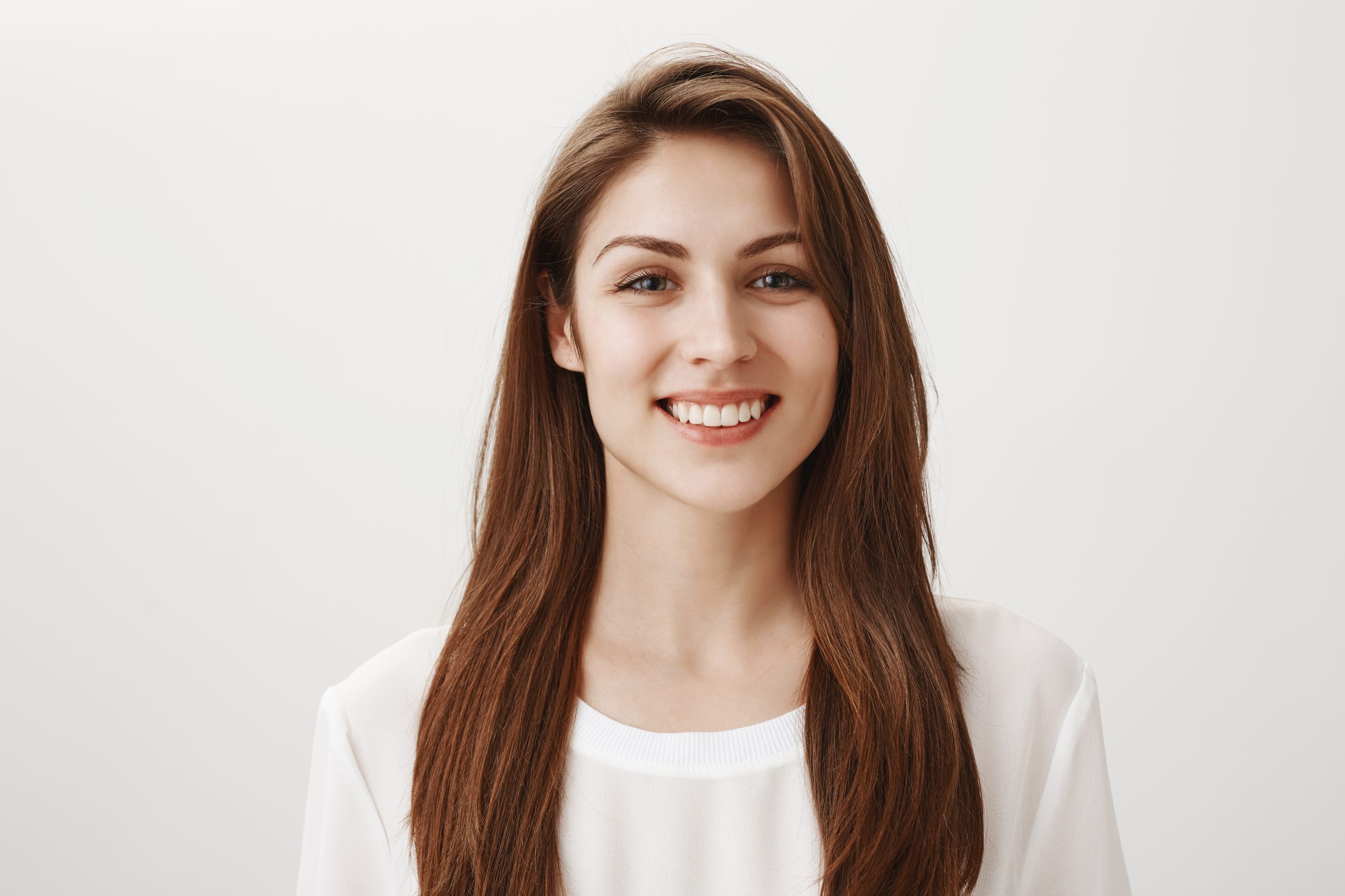 friendly-smiling-woman-looking-pleased-front